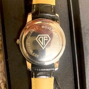David Fashion Quartz Vintage Black Leather watch still in the case never used.